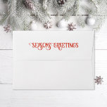 Season's Greetings return address Holiday Envelope<br><div class="desc">Customize your return address on this A7 Envelope . Features red text on front return address and "Season's Greetings" on the back flap. Customize the interior color and stripe or remove pattern</div>