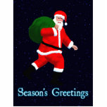 Season's Greetings - Santa Claus Statuette<br><div class="desc">Do you believe in Santa? An image of a striding Santa Claus,  carrying a green bag of presents; superimposed on a starry background. Text reading "Season's Greetings" appears in glowing blue and white.</div>