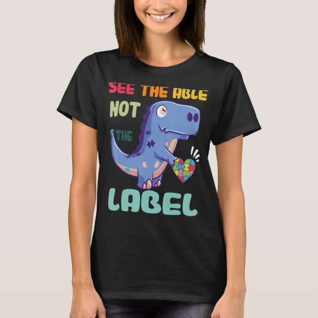 See The Able Not The Label Dinosaur Autism Awarene T-Shirt (Front)