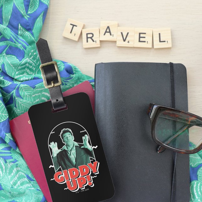 Seinfeld | Kramer - Giddy Up! Luggage Tag (Luggage tag on top of travel accessories)