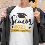 Senior class graduation year name T-Shirt<br><div class="desc">Celebrate your senior and graduation year with this modern t-shirt featuring a contemporary "Senior 20xx" typography in black and gold decorated with a black graduate cap with a golden tassel; easily customize this t-shirt with your graduation year and name by editing the template fields. This t-shirt is part of our...</div>