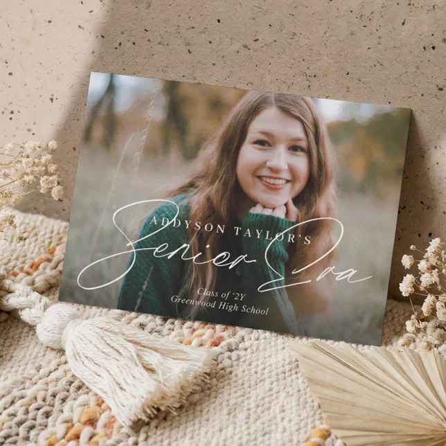 Simple and elegant white script graduation announcement card with a large photo of the graduate. 