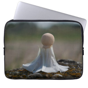 Sensually wrapped figurine in a floral dress. laptop sleeve