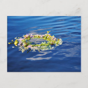Serene Floating Wildflower Wreath on Tranquil Blue Postcard