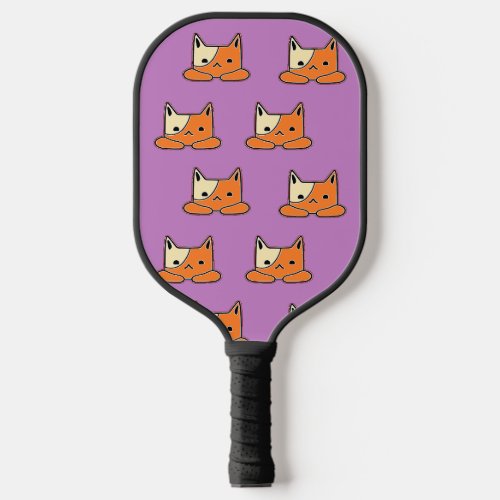 Serious brown cats on purple pickleball paddle
