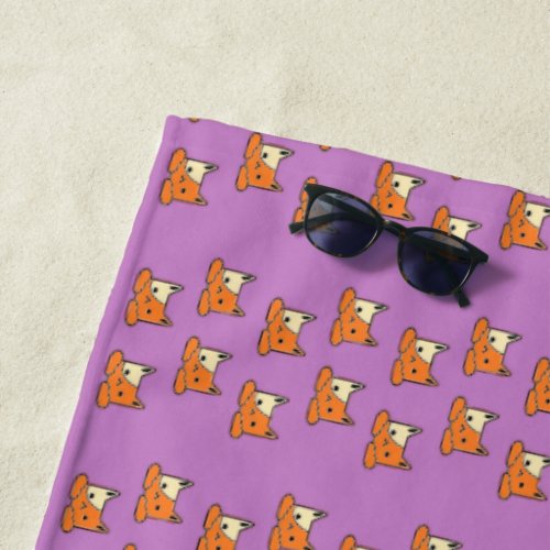 Serious cats on purple beach towel