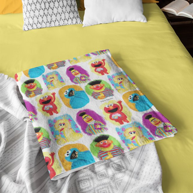Sesame Street Character Fun & Colorful Pattern Fleece Blanket (Blanket folded on bed)