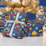 Sesame Street Christmas Lights Pattern Wrapping Paper<br><div class="desc">Add a festive flair to your holiday season with this delightful Sesame Street-themed pattern graphic! Featuring your favorite characters like Elmo, Cookie Monster, Big Bird, and even Barkley the Dog, all wearing their holiday best with Santa hats and nestled in colorful wreaths, this design bursts with holiday cheer. Surrounded by...</div>