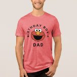 Sesame Street | Elmo - First Birthday Tri-Blend Sh Shirt<br><div class="desc">Let the proud father celebrate in style with the Elmo Birthday Boy's Dad T-Shirt! This shirt features Elmo's huge, energetic smile above the clear text declaring him the "Birthday Boy's Dad." It’s the perfect, comfortable top for the dad attending the party or snapping those memorable photos. This tee is fully...</div>