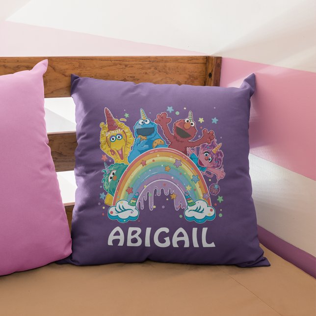 Sesame Street Unicorn Rainbow Throw Pillow (Pillow on bed)