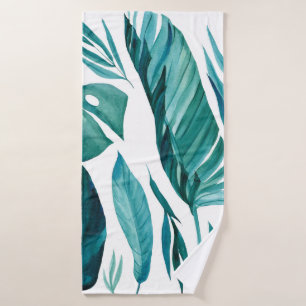 Set of abstract tropical palm leaves on isolated w bath towel