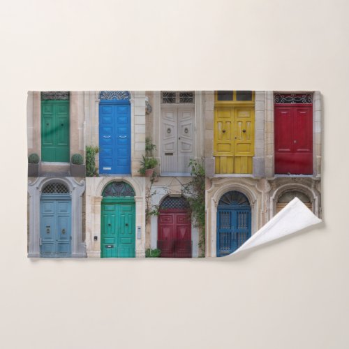 Set of colorful front doors in Malta Hand Towel