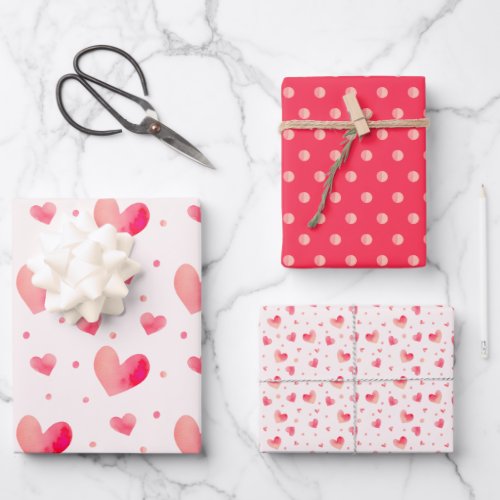Set of seamless patterns with watercolor hearts wrapping paper sheets