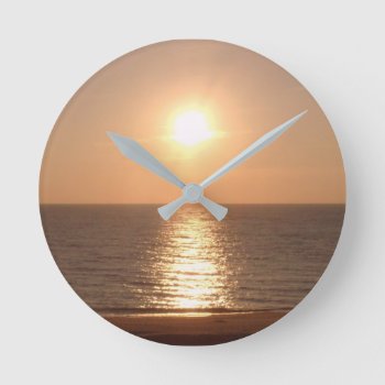 Setting Sun Round Clock by JTHoward at Zazzle
