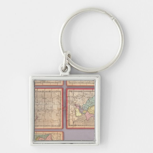 Seven Puzzle Maps of the World Keychain (Front)