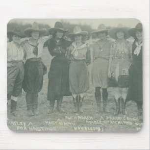 Seven rodeo cowgirls posing for a photograph. mouse pad