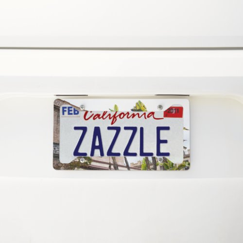 Seville Building with White Bird of Paradise 1  License Plate Frame