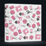 Sewing Themed Binder<br><div class="desc">A binder featuring a sewing themed design consisting of a sewing  machine,  spools of thread,  a pin cushion,  scissors,  fabric swatches,   and sewing needles.  Design has a pink color scheme.</div>