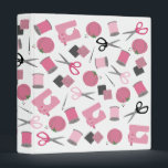 Sewing Themed Binder<br><div class="desc">A binder featuring a sewing themed design consisting of a sewing  machine,  spools of thread,  a pin cushion,  scissors,  fabric swatches,   and sewing needles.  Design has a pink color scheme.</div>