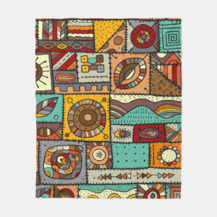 Sewn pieces of fabric in a patchwork style. Ethnic Fleece Blanket