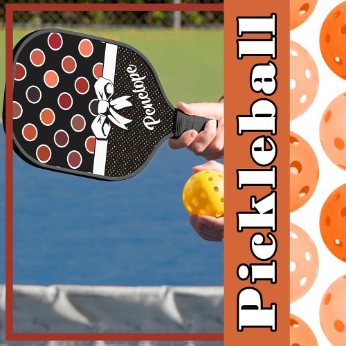 Shades of Red Polka Dots on Black Faux White Bow Pickleball Paddle