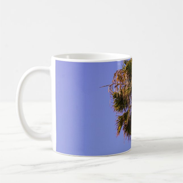 Shallow focus photo of green tree coffee mug (Left)