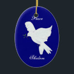 Shalom-White Peace Dove Ornament<br><div class="desc">This beautiful symbol of peace,  a white dove and the words Shalom,  and Peace will be a fine addition to your keepsake ornaments this year.  The reverse side also has the dove with deep blue background,  and the year,  which can be customized.</div>