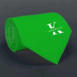 Shamrock Green Elegant Monogram   Name Neck Tie<br><div class="desc">An elegant two-sided necktie featuring a bold white monogram across a Festive Shamrock Green background. On top of this monogram sits your first or last name spelled out in all capitals. If you prefer a bolder look for the personal name inside of the large letter you can do the following:...</div>