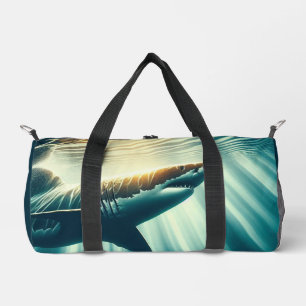 Shark in the deep blue sea & sunlight duffle bag