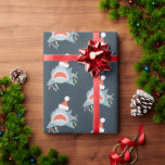 Shark Santa Claus Blue Christmas Holiday Wrapping Paper<br><div class="desc">This cute christmas holiday wrapping paper features a navy blue background with patterns of a shark with a santa hat and christmas lights. Change the background colors and personalize it for your needs. You can find matching products at my store.</div>