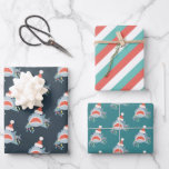 Shark Santa Claus Blue Christmas Holiday Wrapping Paper Sheets<br><div class="desc">This cute christmas holiday wrapping paper features a set of 3 different designs of wrapping papers. 1. a navy blue background with patterns of a shark with a santa hat and christmas lights. 2. a white background with red and sky blue diagnol stripes. 3. a teal background with patterns of...</div>
