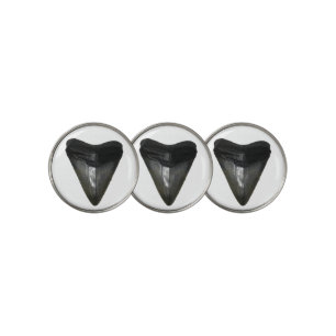 Shark's tooth golf ball marker