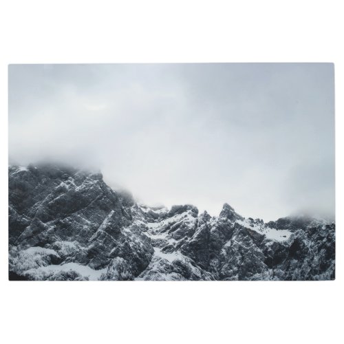 Sharp edges of mountains and soft clouds metal print