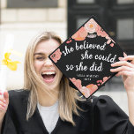She Believed She Could | Custom Class Year Graduation Cap Topper<br><div class="desc">Cute grad cap topper features the quote "she believed she could,  so she did" in white calligraphy lettering on a black background adorned with blush pink and peach flowers. Personalize with your class year.</div>