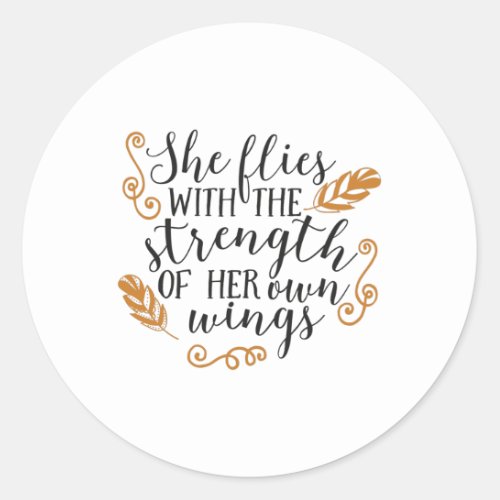 She flies with the strength of her own wings classic round sticker