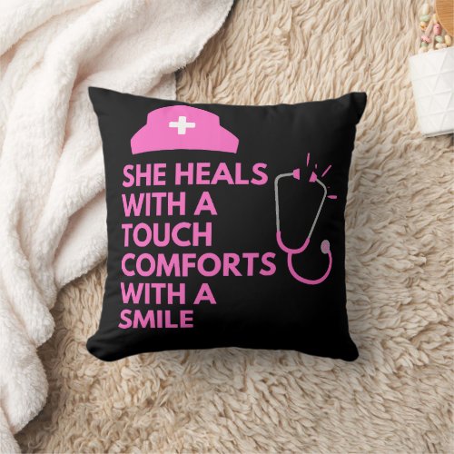 She heals with a touch comforts with a smileNurse Throw Pillow