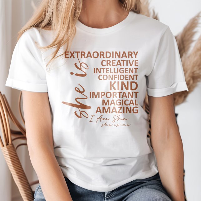 "She is Me" Mocha Mousse Affirmation Typography T-Shirt (Young blond woman wearing a "She is Me" Mocha Mousse Affirmation Typography T-Shirt.)