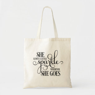 She leaves a little sparkle tote bag