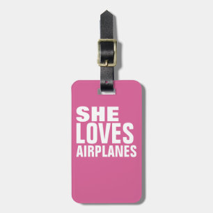 she loves airplanes, pink luggage tag