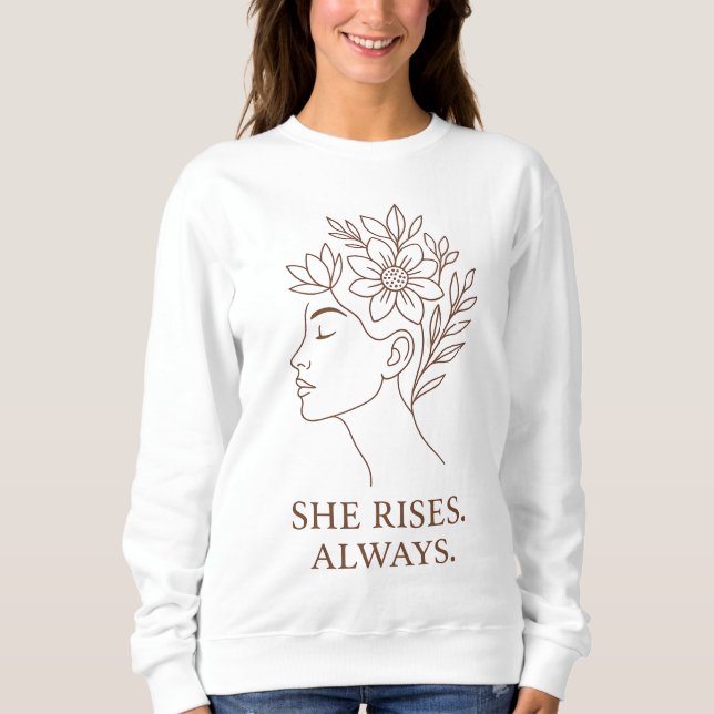 She Rises. Always — Minimalist Empowerment Design Sweatshirt (Front)