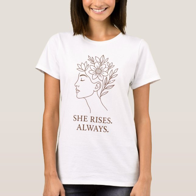 She Rises. Always — Minimalist Empowerment Design T-Shirt (Front)