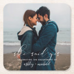 She Said Yes Calligraphy Engagement Party Photo Square Paper Coaster<br><div class="desc">It's time to celebrate! Our She Said Yes Calligraphy Engagement Party Coaster features your full bleed engagement photo with a white hand lettered overlay saying 'she said yes' personalized with your names in a combination of white sans serif and hand written calligraphy script fonts - a beautiful design for a...</div>