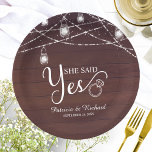 She Said Yes Rustic Engagement Party Paper Plates<br><div class="desc">Rustic chic engagement party paper plate. Easy to personalize with your details. Please get in touch with me via chat if you have questions about the artwork or need customization. PLEASE NOTE: For assistance on orders,  shipping,  product information,  etc.,  contact Zazzle Customer Care directly https://help.zazzle.com/hc/en-us/articles/221463567-How-Do-I-Contact-Zazzle-Customer-Support-.</div>