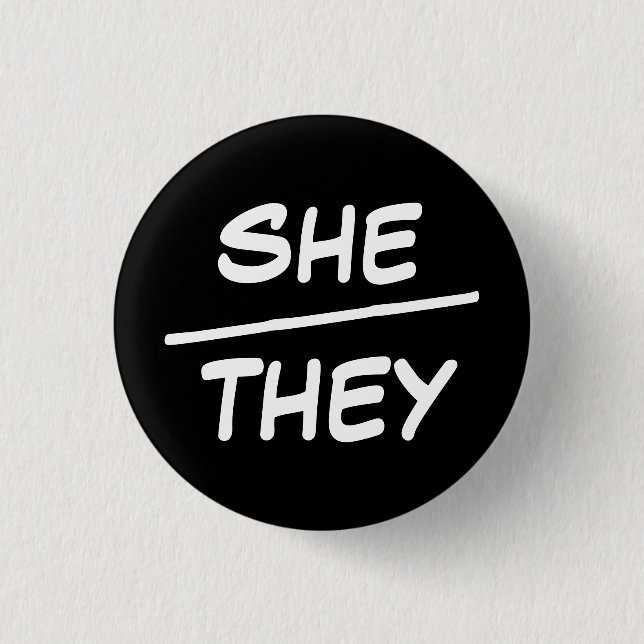 She/They Pronouns Black & White Badge Button (Front)