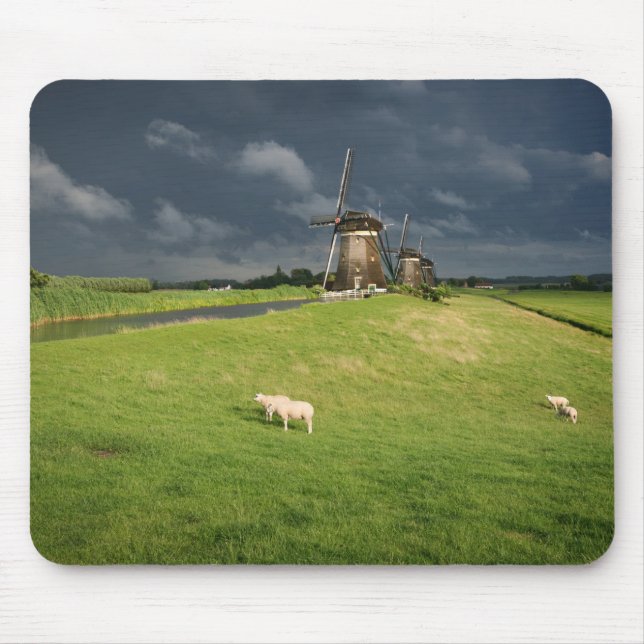 Sheep with windmills under dark clouds mouse pad (Front)