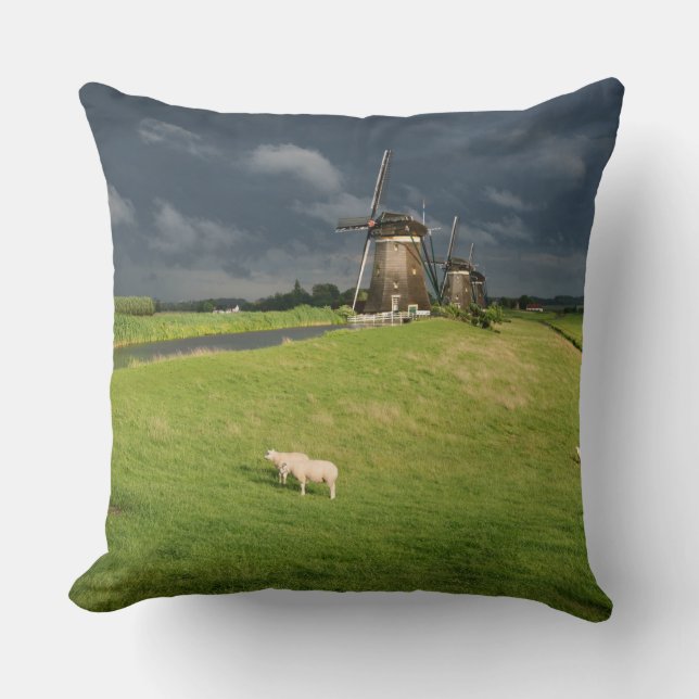 Sheep with windmills under dark clouds throw pillow (Front)
