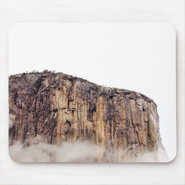 Sheer cliff rising above clouds mouse pad (Front)