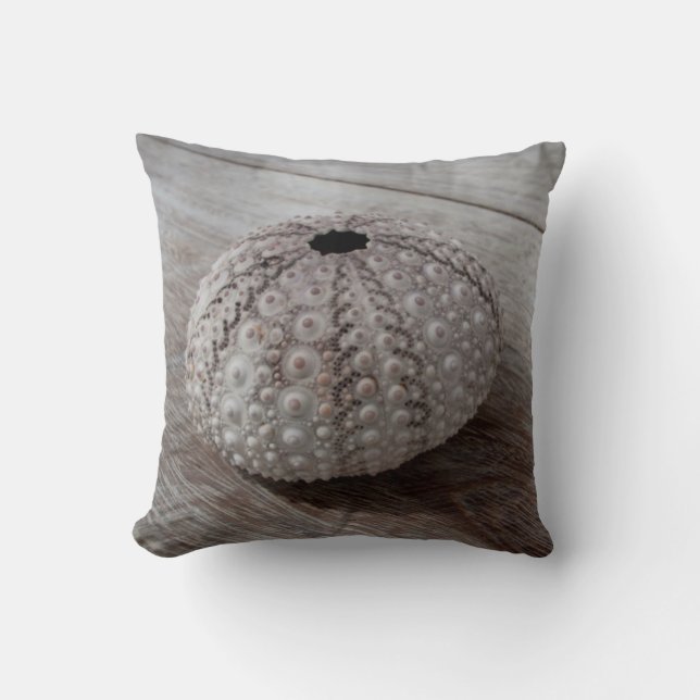 Shell On Top Of A Wooden Table Throw Pillow (Front)