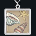 Shell Trio on Khaki Silver Plated Necklace<br><div class="desc">Megan Meagher is known for her simple art pieces. This is a great image of decorative art capturing the sea life with a yellow starfish and a blue and red conch shell. Get this fine art print today on Khaki color on your Zazzle product.</div>