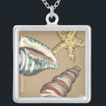Shell Trio on Khaki Silver Plated Necklace<br><div class="desc">Megan Meagher is known for her simple art pieces. This is a great image of decorative art capturing the sea life with a yellow starfish and a blue and red conch shell. Get this fine art print today on Khaki color on your Zazzle product.</div>